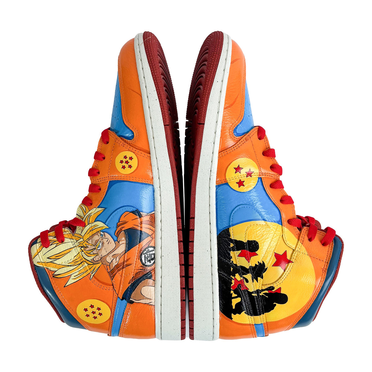 Goku and sunset silhouette on outer sides of pair